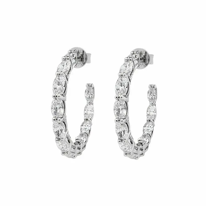 
                      
                        Zilveren creolen met ovale zirkonia stenen  Victoria Valenza
                      
                    