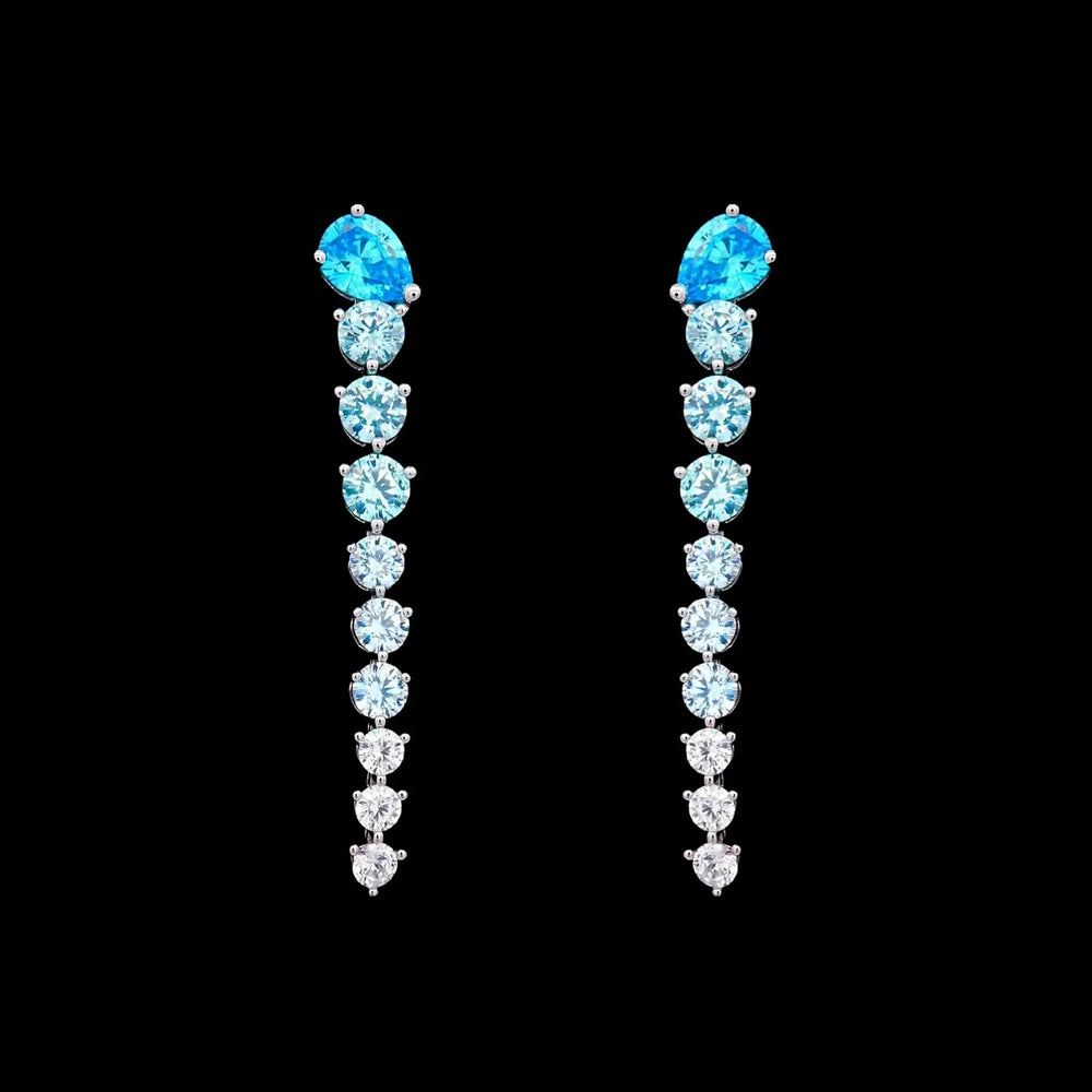 Zilveren lange oorbellen met turquoise zirkonia's  Victoria Valenza