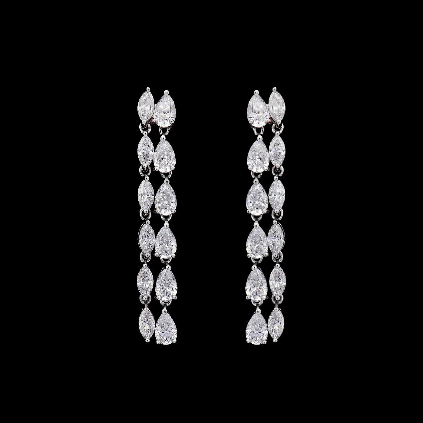 Zilveren dubbele oorbellen met markies en peervormige zirkonia stenen  Victoria Valenza