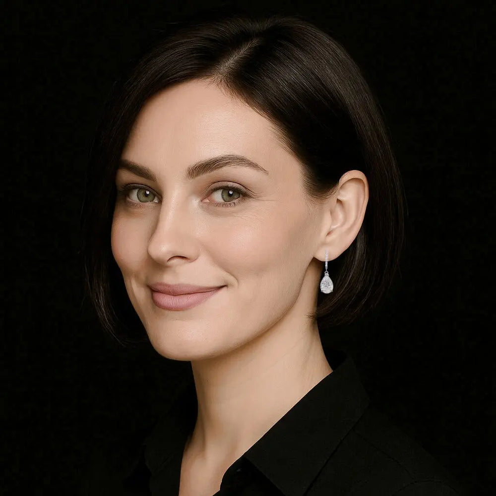 Zilveren oorbellen met peervormige zirkonia stenen  Victoria Valenza