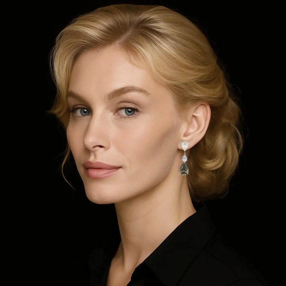 Zilveren oorbellen met bruine peervormige zirkonia stenen  Victoria Valenza