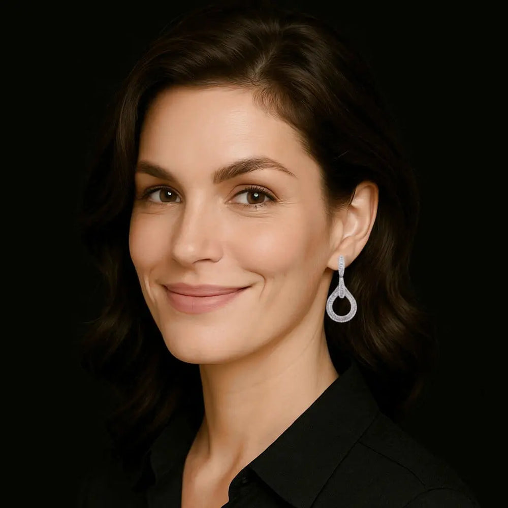 Zilveren druppel oorbellen met baquette zirkonia stenen  Victoria Valenza