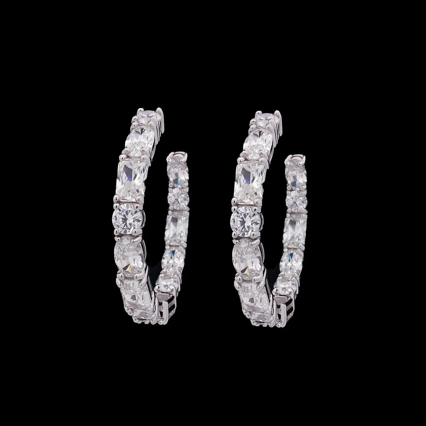 Zilveren creolen met ronde, rechthoekige en ovale zirkonia stenen  Victoria Valenza