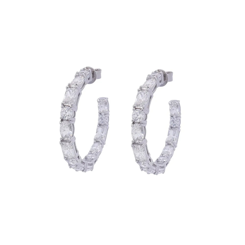 
                      
                        Zilveren creolen met ronde, rechthoekige en ovale zirkonia stenen  Victoria Valenza
                      
                    