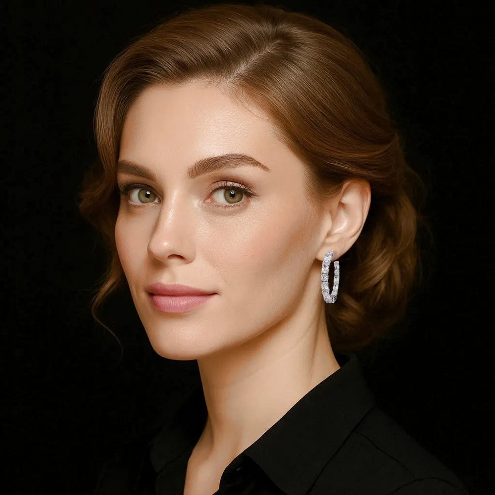 Zilveren creolen met ronde, rechthoekige en ovale zirkonia stenen  Victoria Valenza