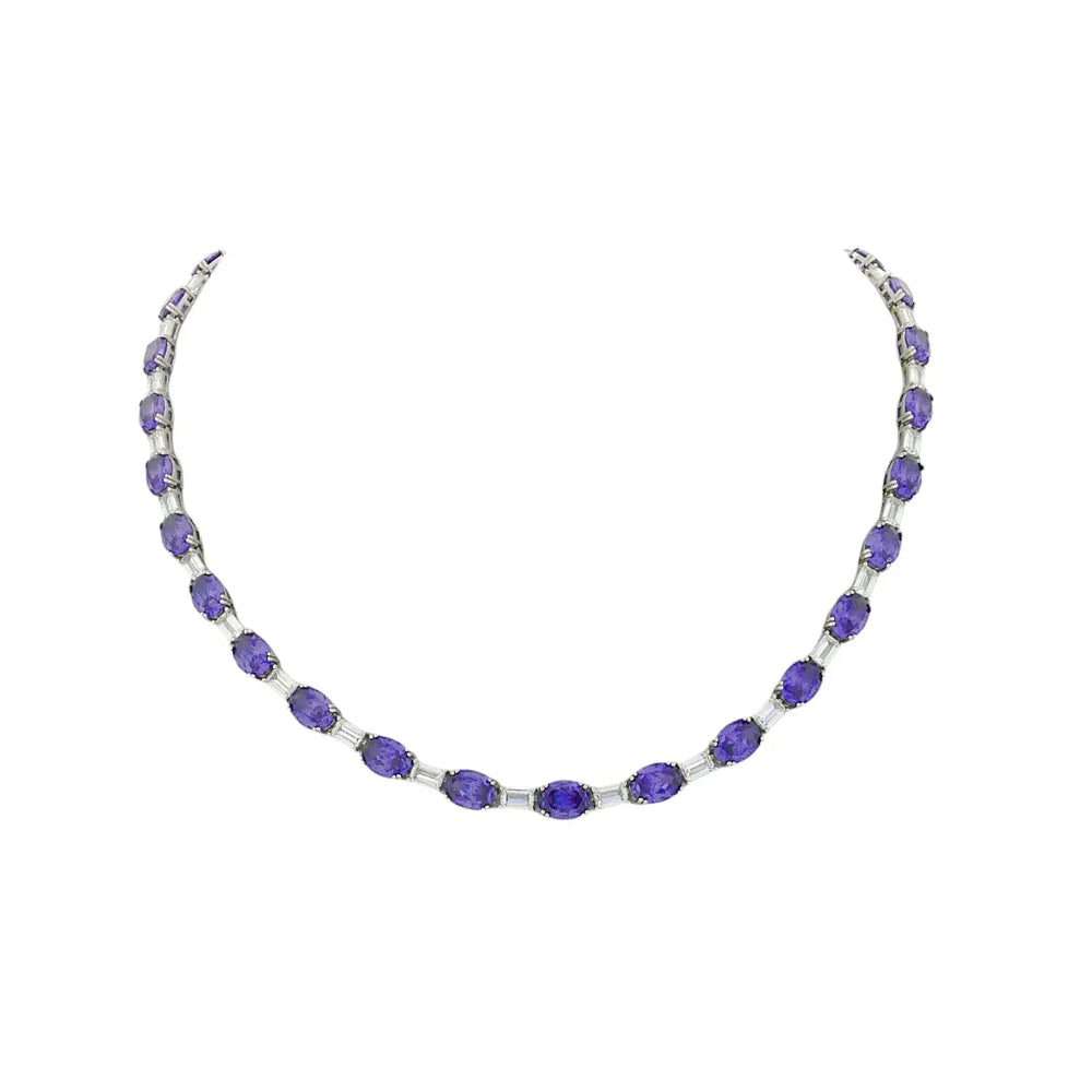 
                      
                        Zilveren collier met tanzanietkleurige zirkonia stenen  Victoria Valenza
                      
                    