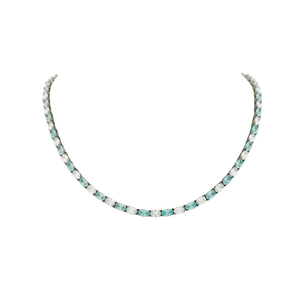 
                      
                        Zilveren collier met aquamarijnkleurige zirkonia stenen  Victoria Valenza
                      
                    