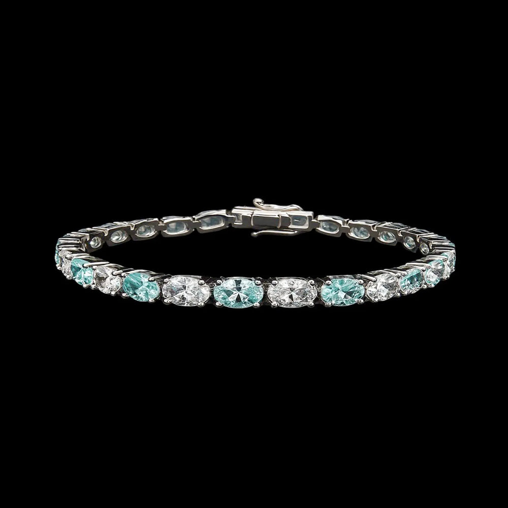 Zilveren armband met aquamarijnkleurige zirkonia stenen  Victoria Valenza