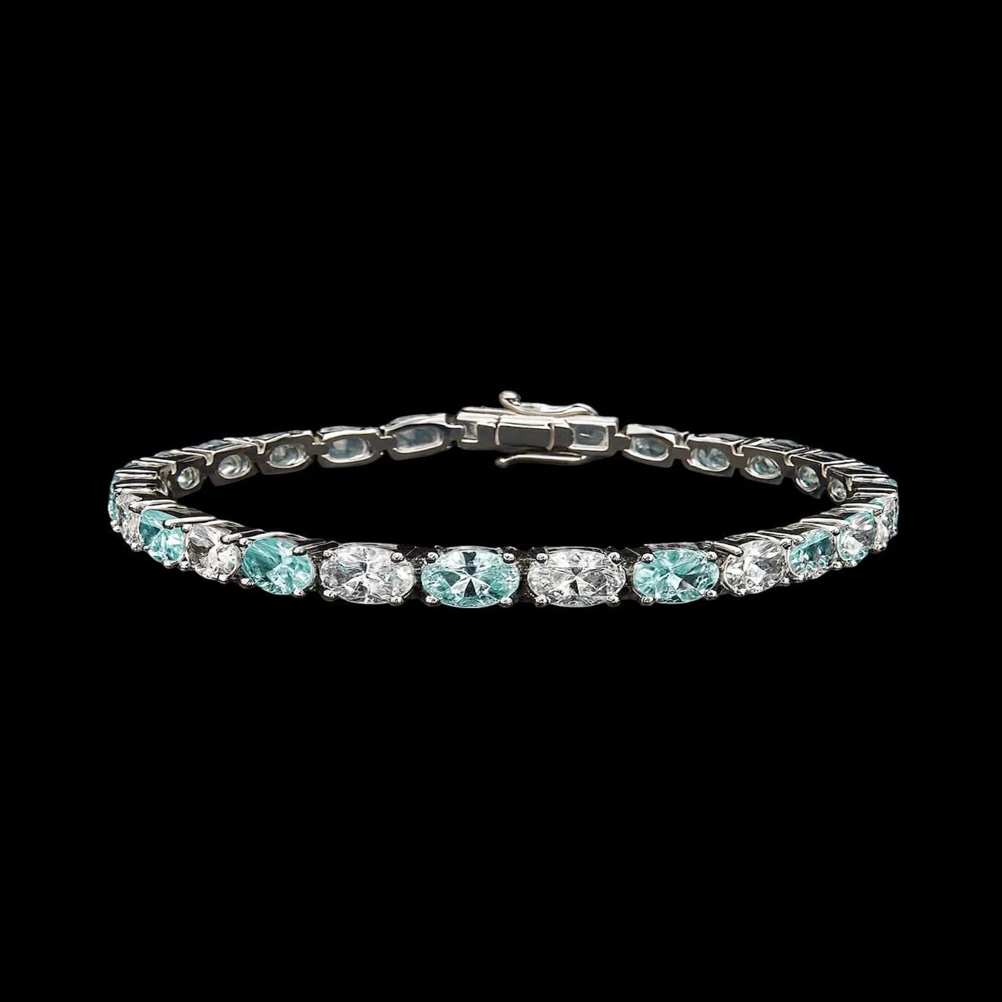 Zilveren armband met aquamarijnkleurige zirkonia stenen  Victoria Valenza