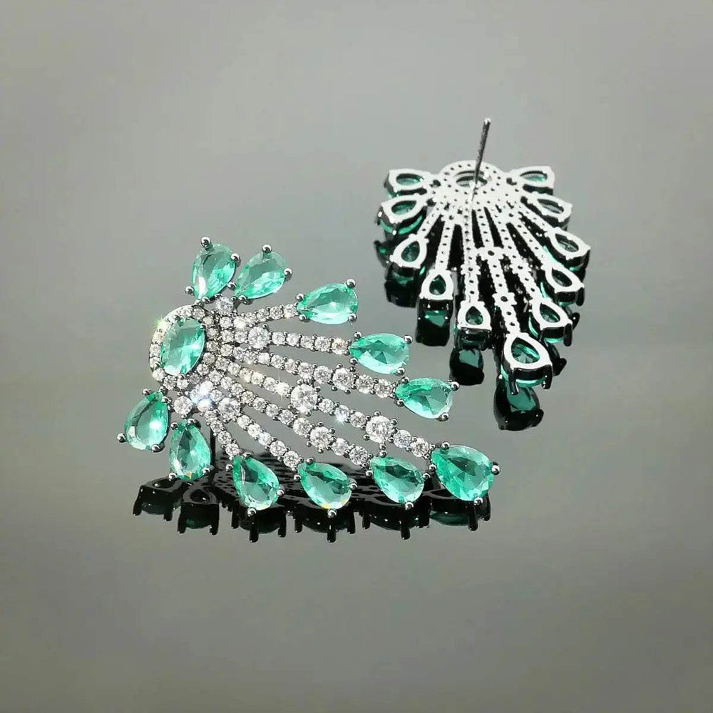 
                      
                        Fancy oorbellen met groene zirkonia's - Victoria Valenza
                      
                    