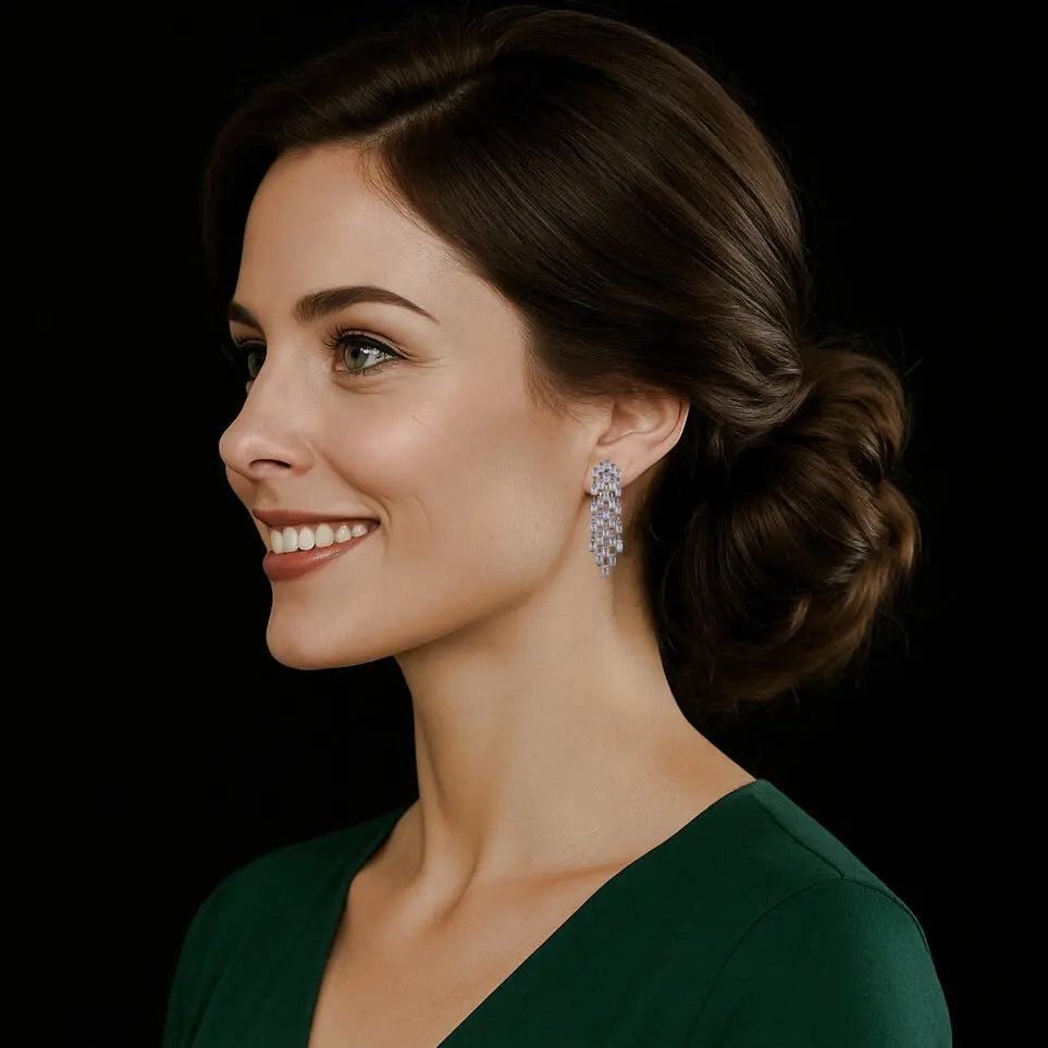 Zilverkleurige cascade oorbellen met clipsen en baquette zirkonia stenen  Victoria Valenza