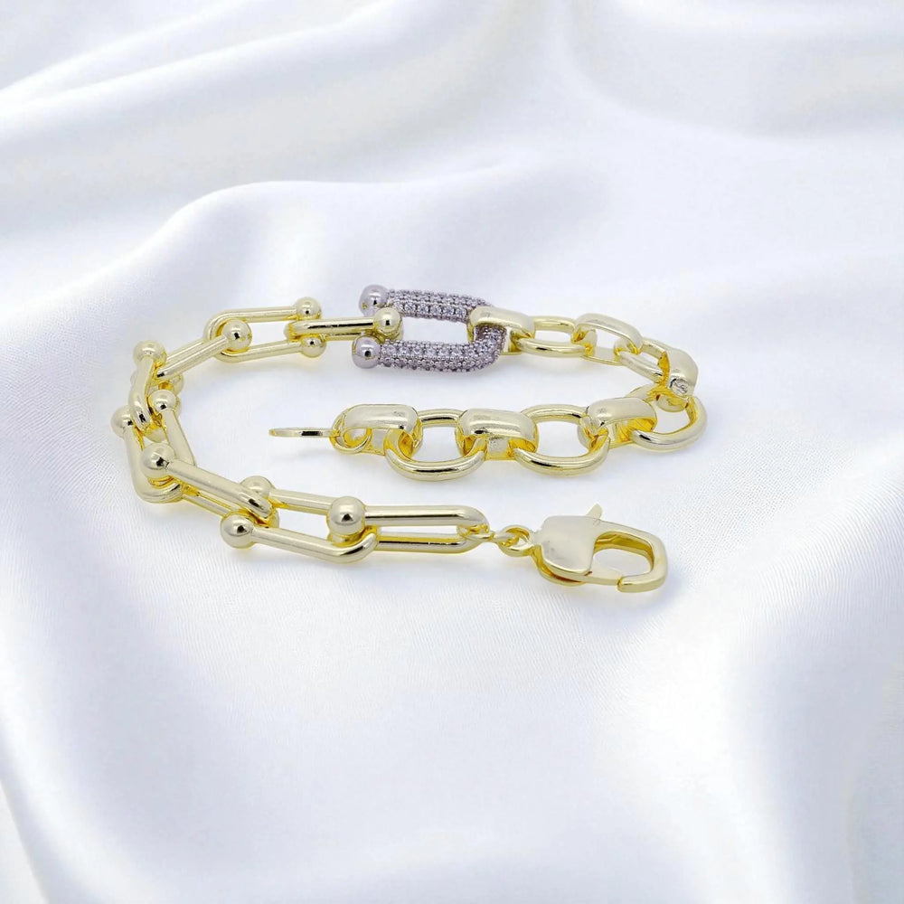 
                      
                        Bicolour combinatie schakelarmband met zirkonia stenen  Victoria Valenza
                      
                    