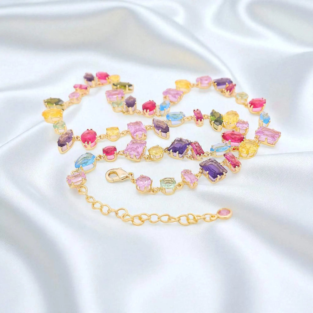 
                      
                        Goudkleurige collier met multicolor zirkonia stenen  Victoria Valenza
                      
                    