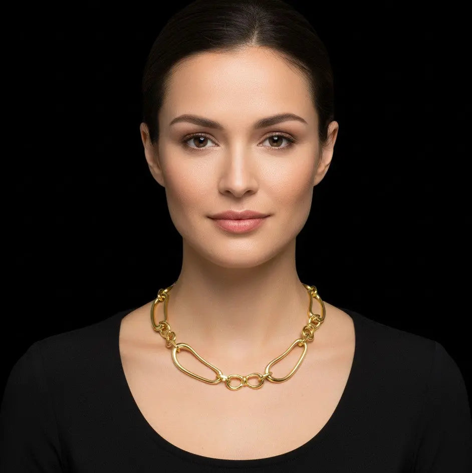 Goudkleurige open design collier  Victoria Valenza