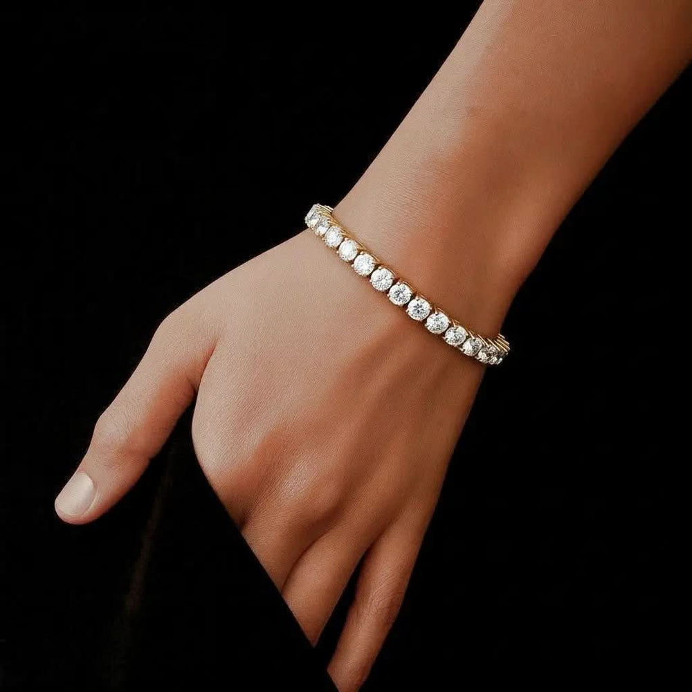 Goudkleurige RVS tennisarmband 20,5 cm met 5 mm zirkonia stenen  Victoria Valenza