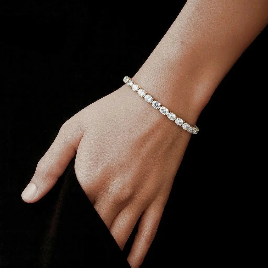 Goudkleurige RVS tennisarmband 18,3 cm met ovale zirkonia stenen  Victoria Valenza