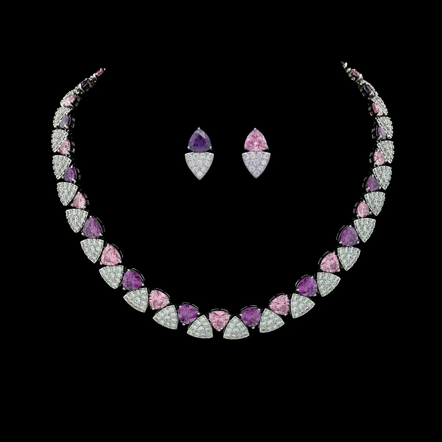 Zilverkleurige collier en oorbellen met paarse en roze zirkonia stenen  Victoria Valenza