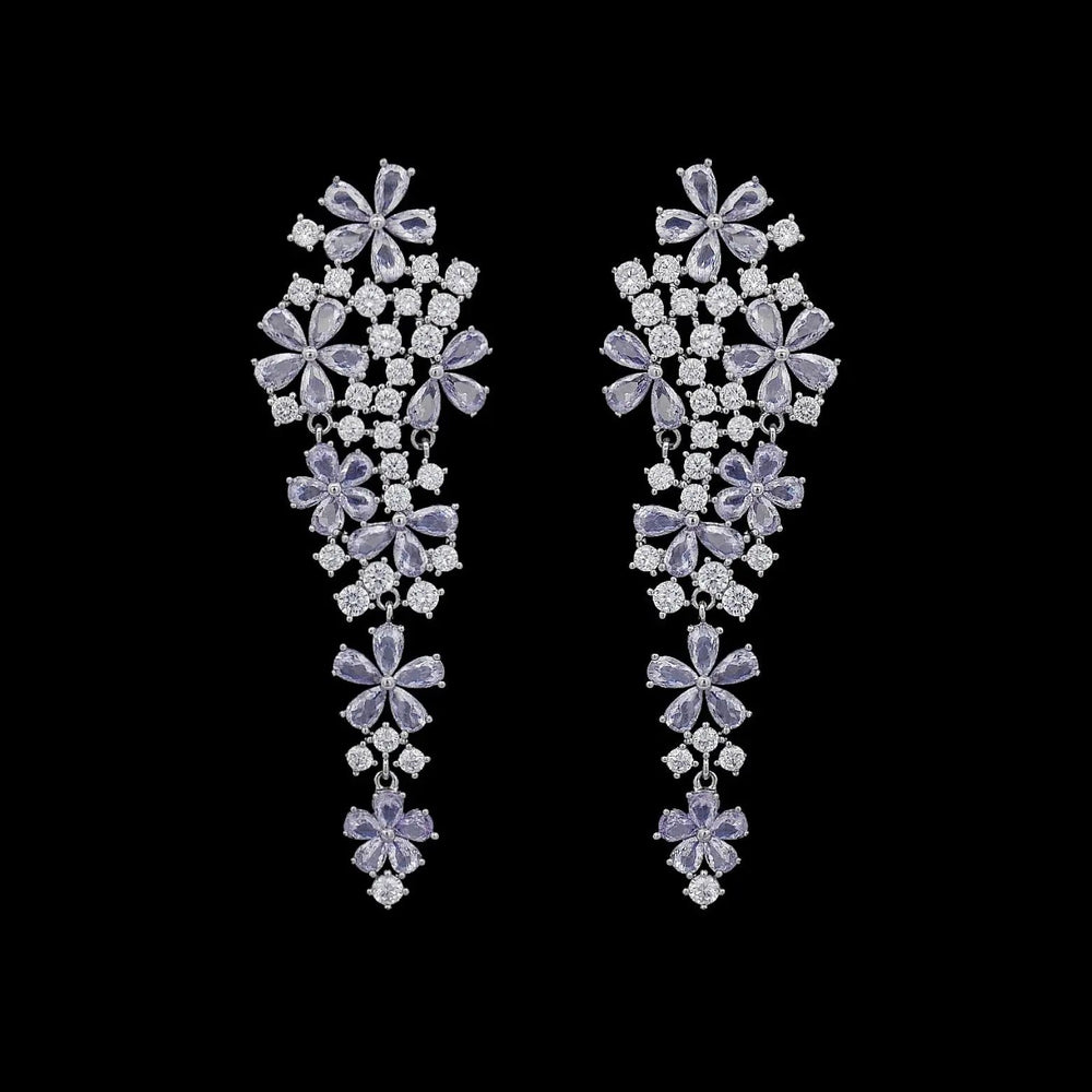 Zilverkleurige bloemenzee oorbellen met lichtpaarse zirkonia stenen  Victoria Valenza