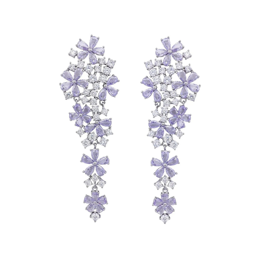 
                      
                        Zilverkleurige bloemenzee oorbellen met lichtpaarse zirkonia stenen  Victoria Valenza
                      
                    