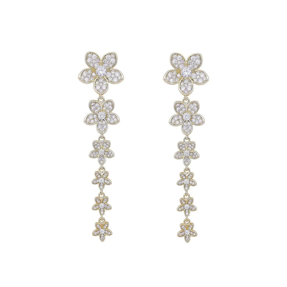 
                      
                        Goudkleurige bloemenwaterval oorbellen met zirkonia stenen  Victoria Valenza
                      
                    