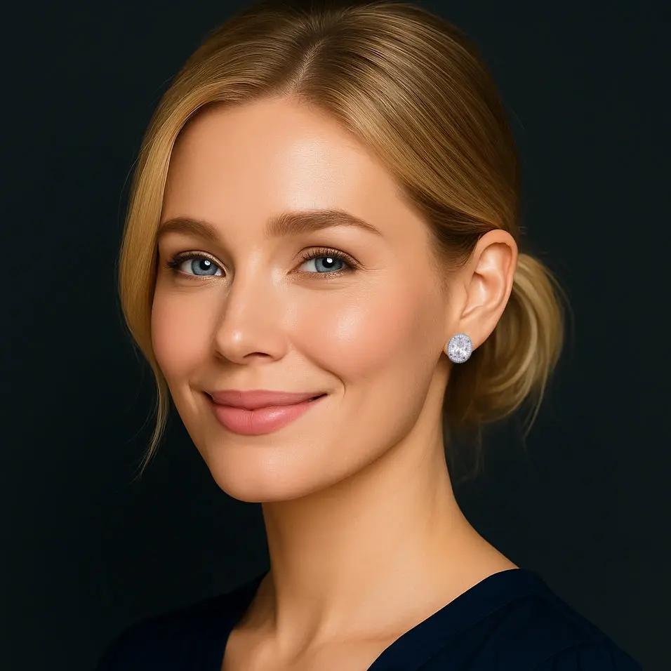 Zilverkleurige ovale entourage oorbellen pavé rand met zirkonia stenen  Victoria Valenza