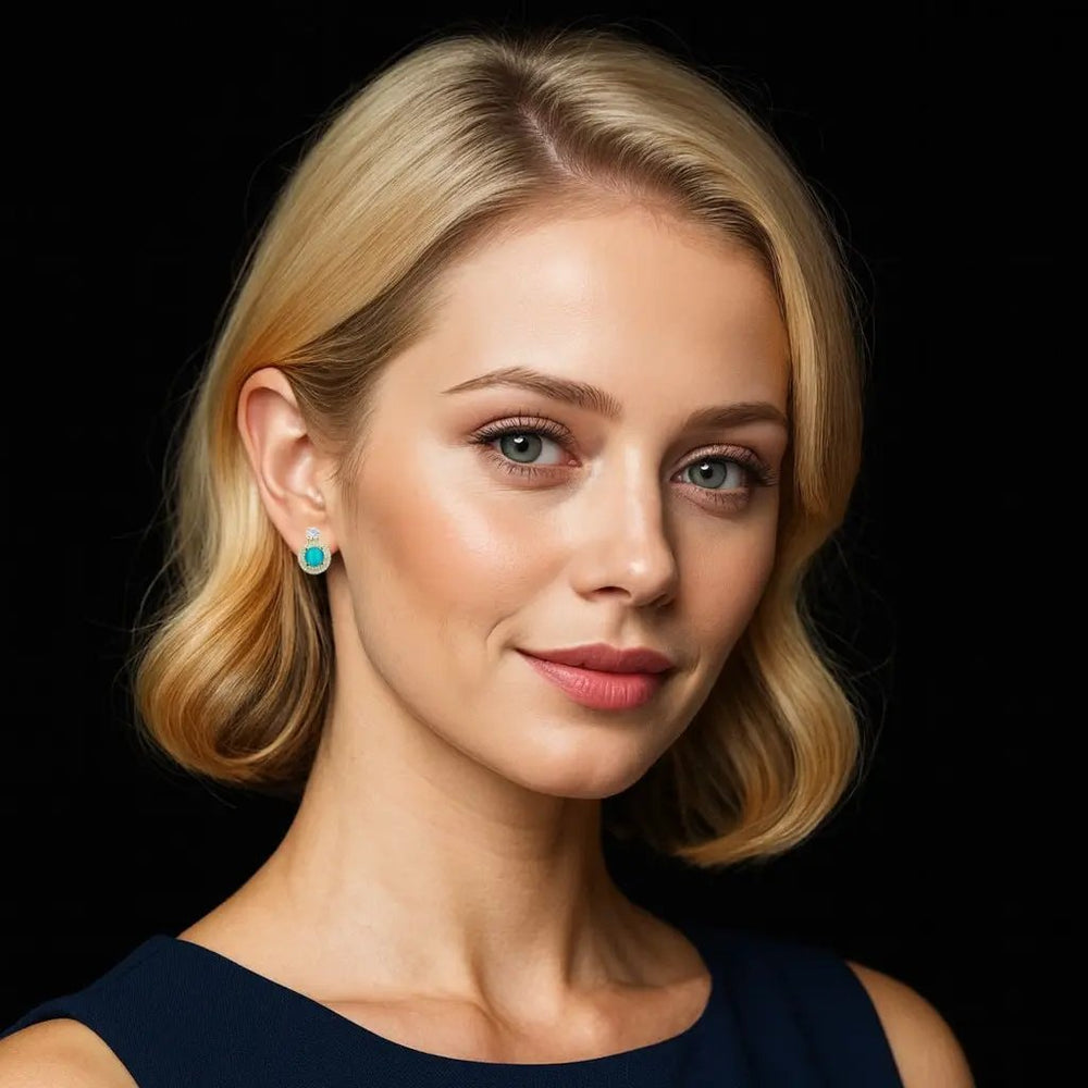 Goudkleurige fantasie oorbellen blauwe maansteen en zirkonia stenen  Victoria Valenza