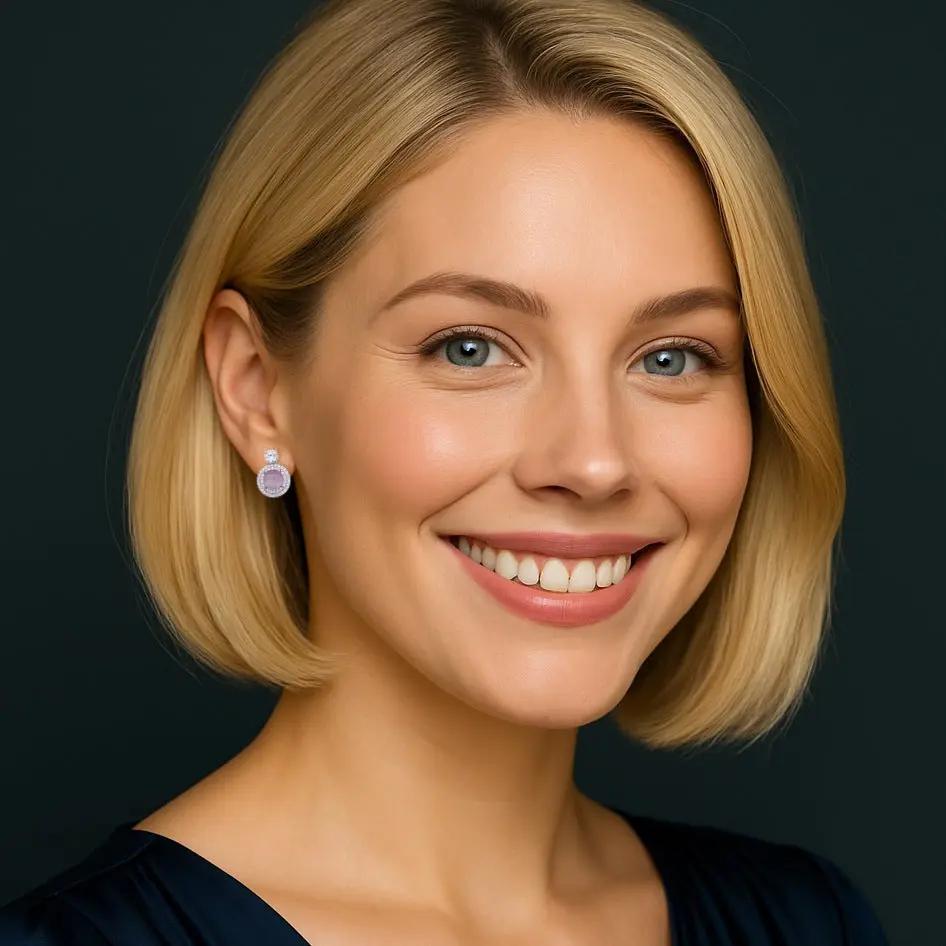 Zilverkleurige fantasie oorbellen roze maansteen en zirkonia stenen  Victoria Valenza