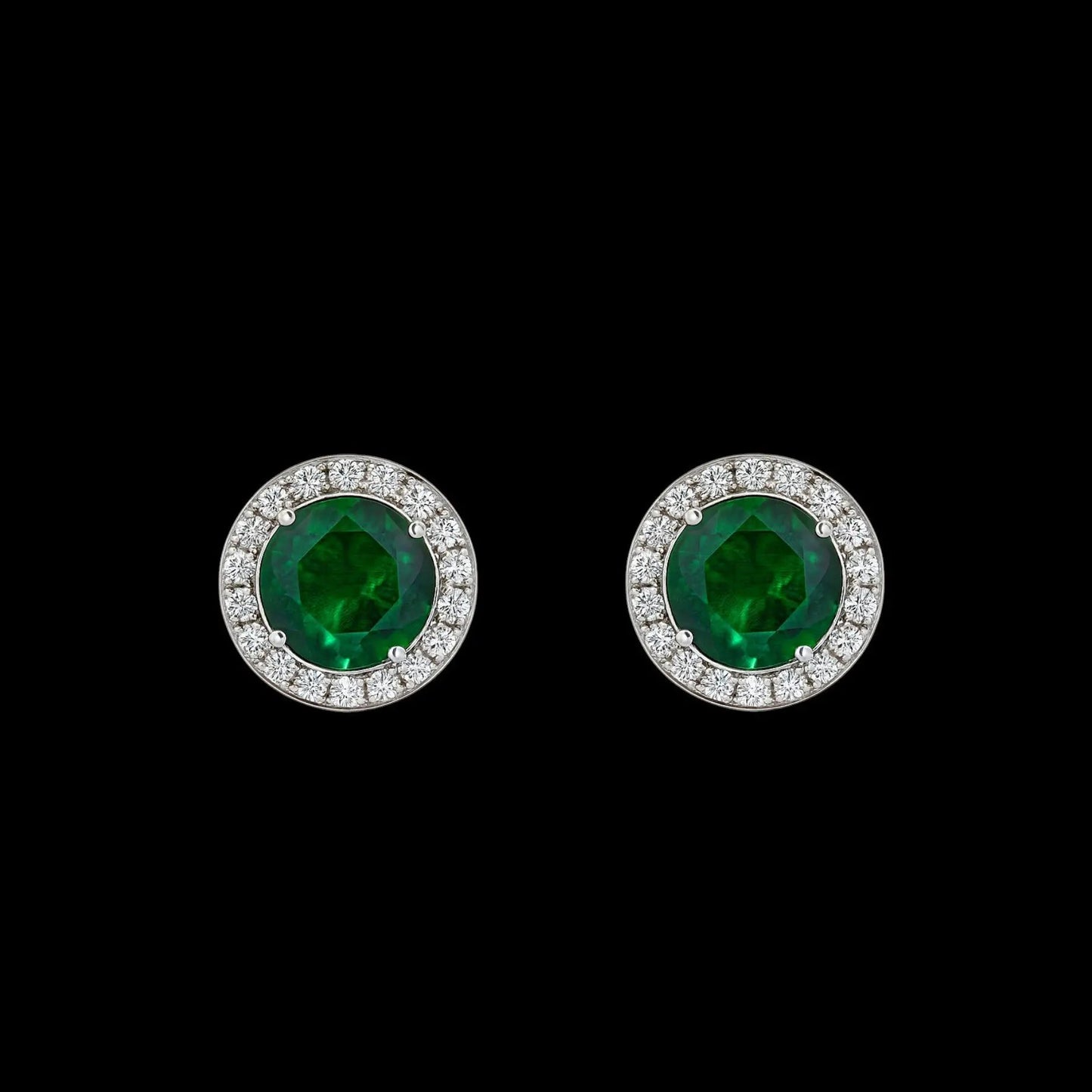 Zilverkleurige ronde groene entourage oorbellen met zirkonia stenen  Victoria Valenza