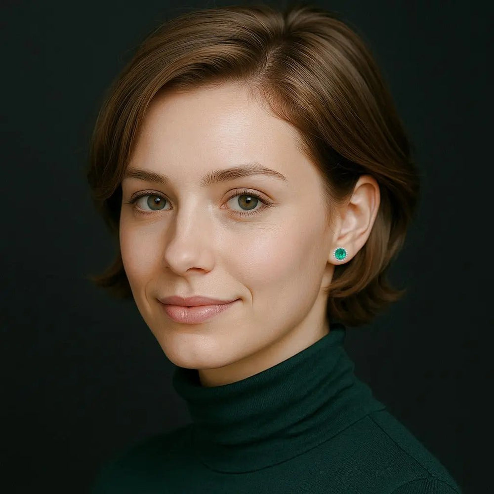 Zilverkleurige ronde turquoise entourage oorbellen met zirkonia stenen  Victoria Valenza