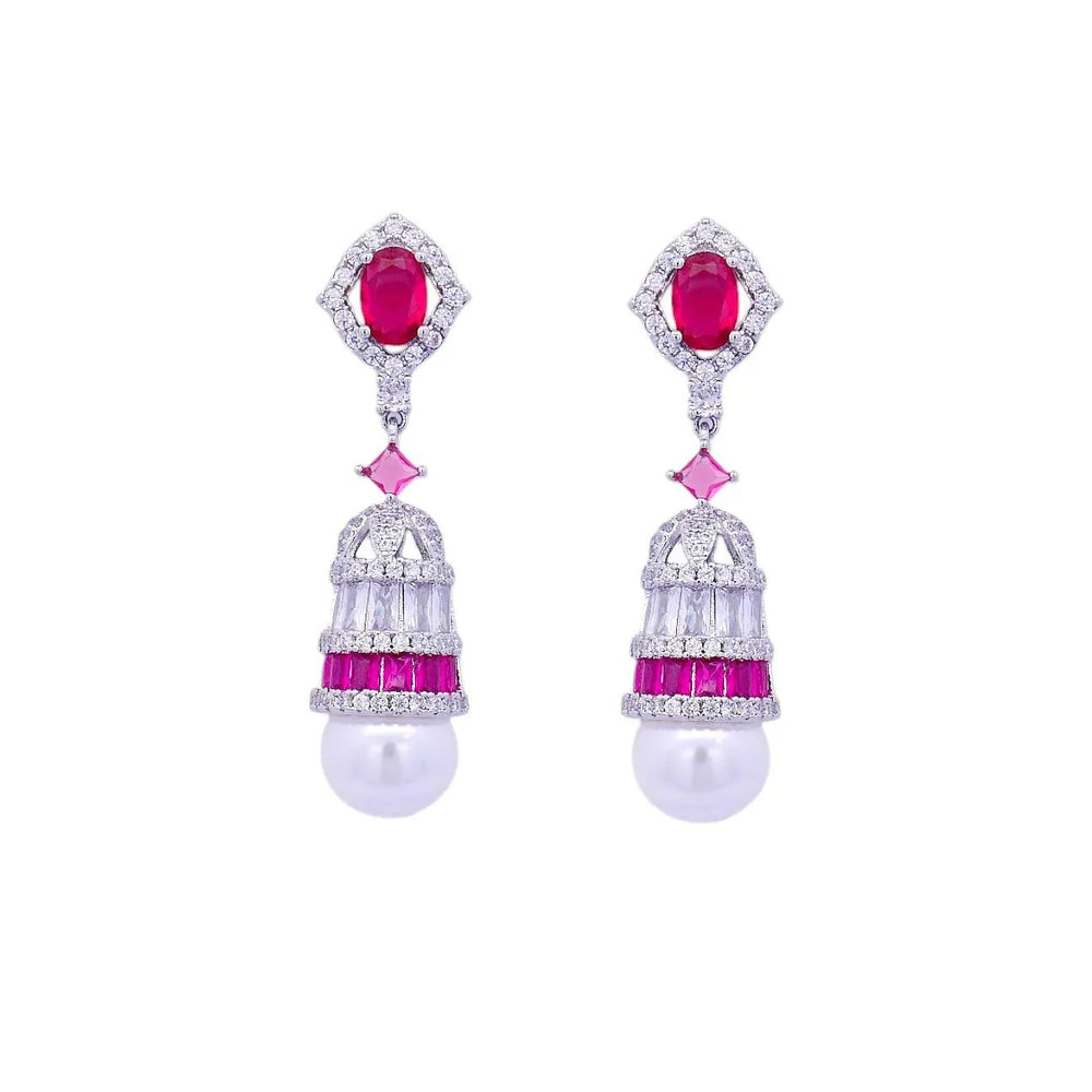 
                      
                        Zilverkleurige Art Deco model oorbellen met parels en roze zirkonia stenen  Victoria Valenza
                      
                    