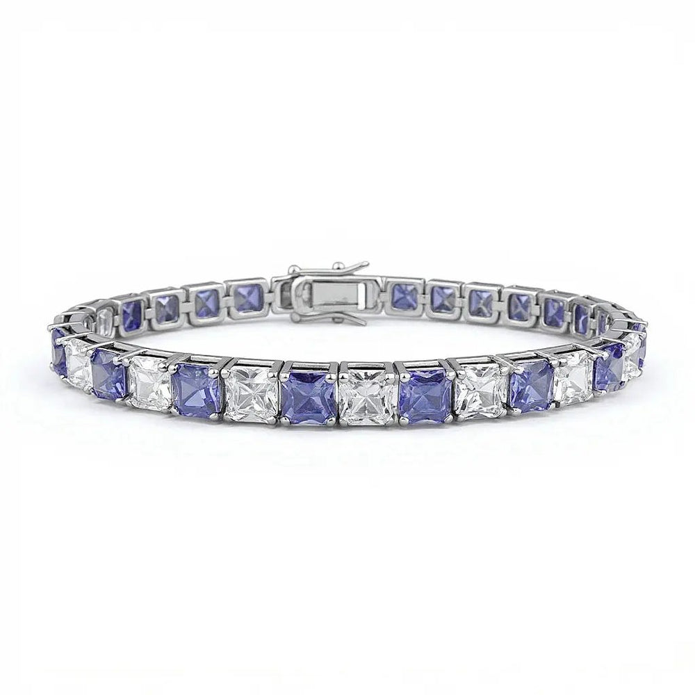 
                      
                        Zilveren luxe armband met tanzanietkleurige zirkonia stenen  Victoria Valenza
                      
                    