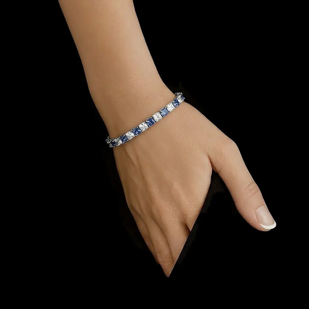 Zilveren luxe armband met tanzanietkleurige zirkonia stenen  Victoria Valenza