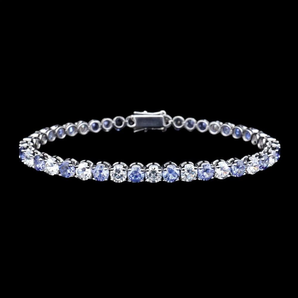 Zilveren tennisarmband met tanzanietkleurige zirkonia stenen  Victoria Valenza