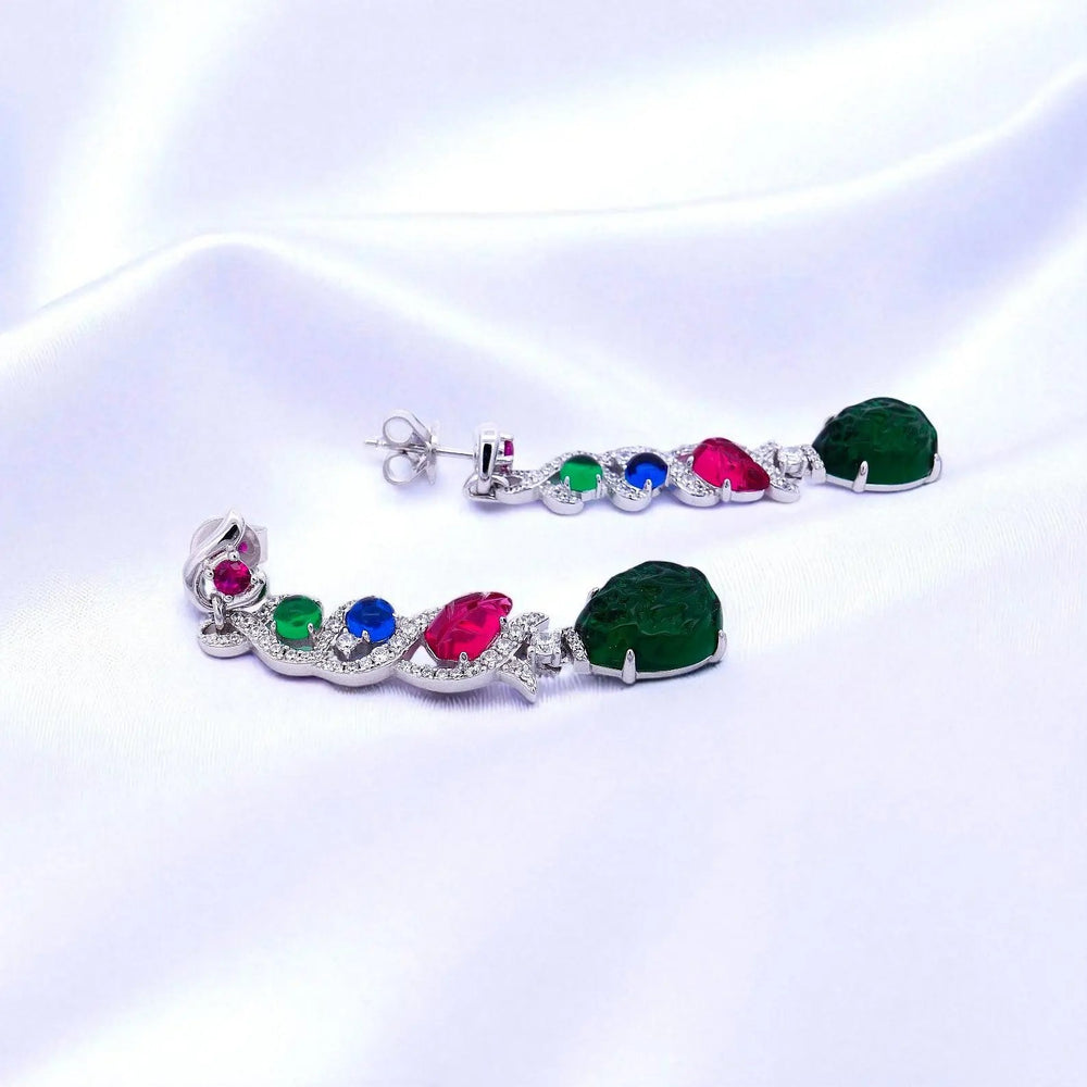 
                      
                        Zilveren fantasie oorbellen met multicolour zirkonia stenen  Victoria Valenza
                      
                    