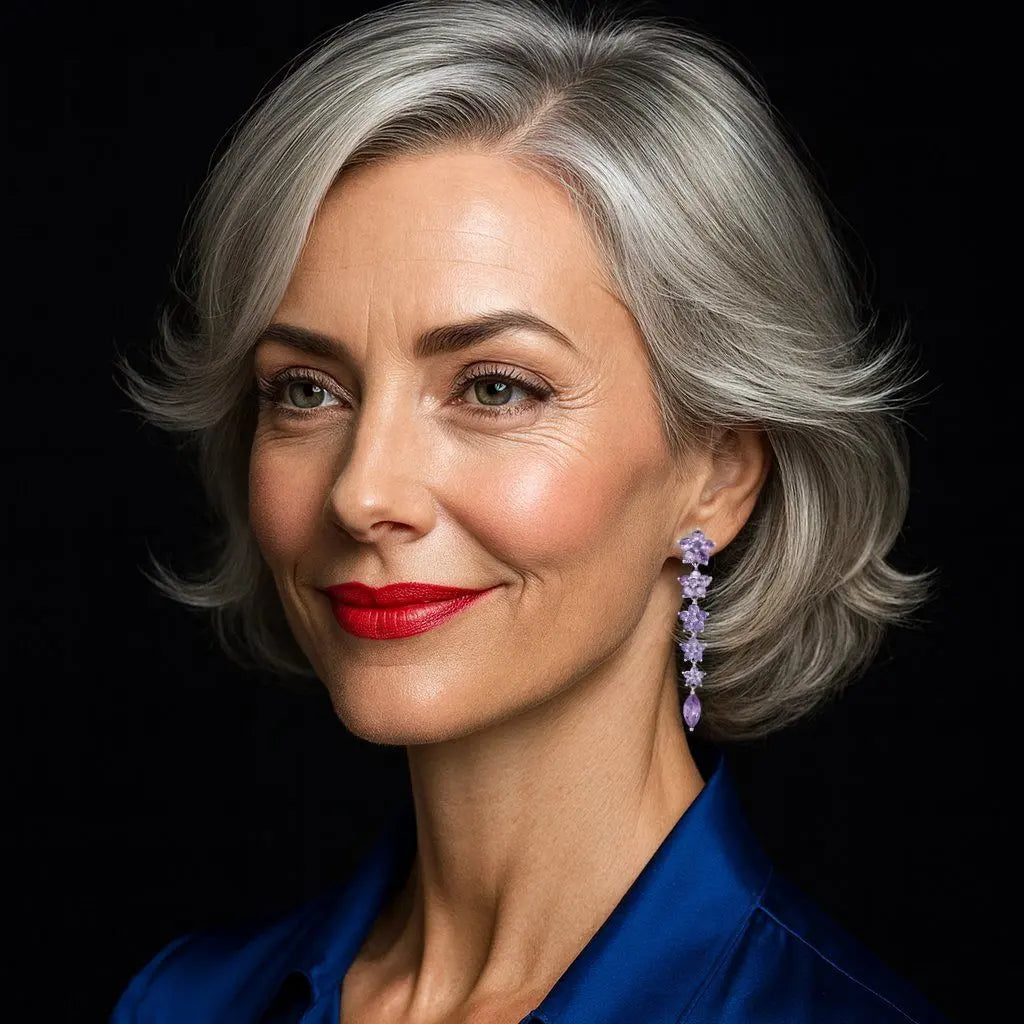 Zilverkleurige avondbloem oorbellen met paarse zirkonia stenen  Victoria Valenza