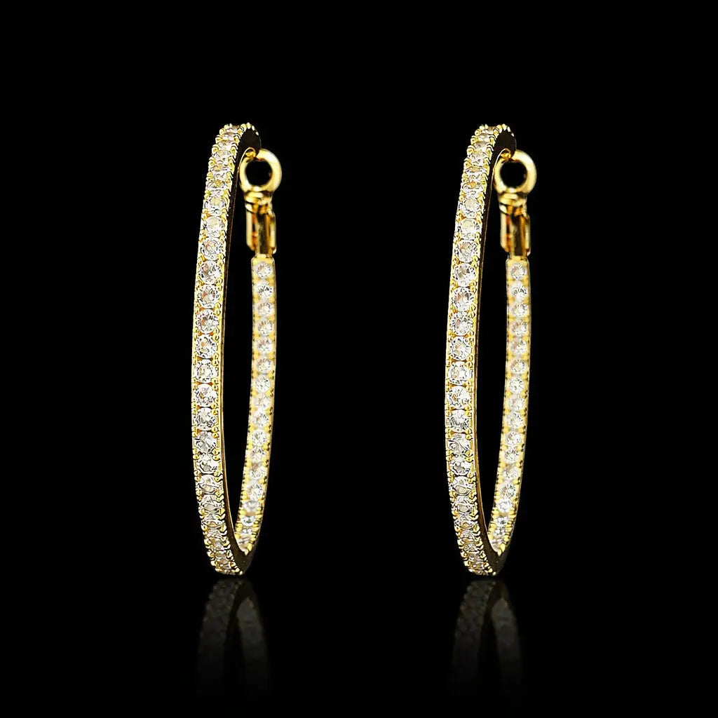 Goudkleurige ovale oorbellen met zirkonia stenen  Victoria Valenza