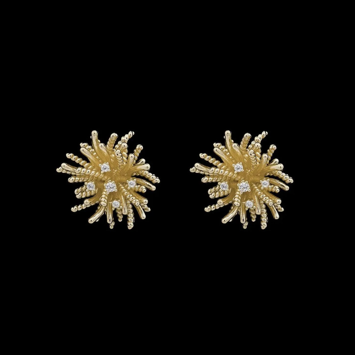 Goudkleurige vuurwerk oorbellen met zirkonia stenen  Victoria Valenza