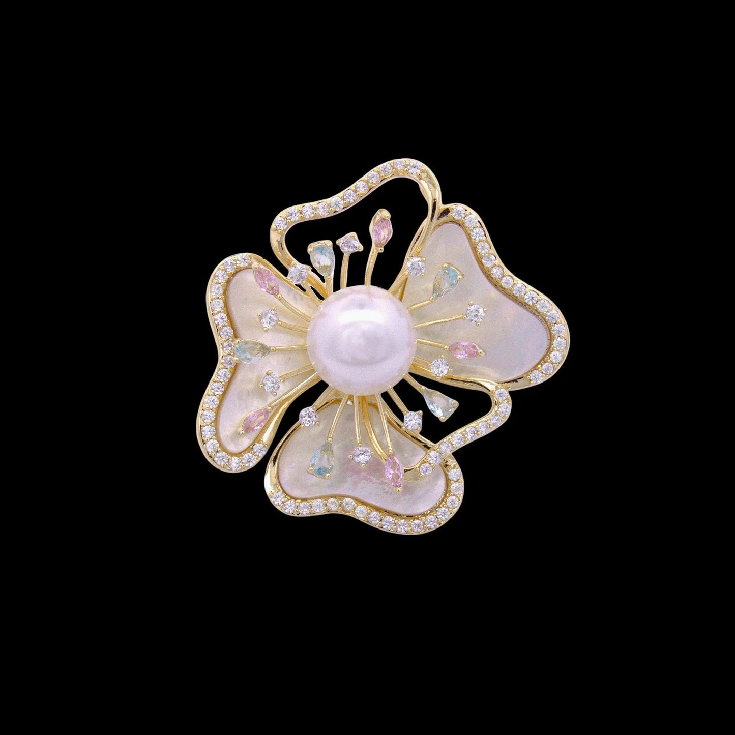 Goudkleurige anemoon broche met parelmoer en zirkonia stenen  Victoria Valenza