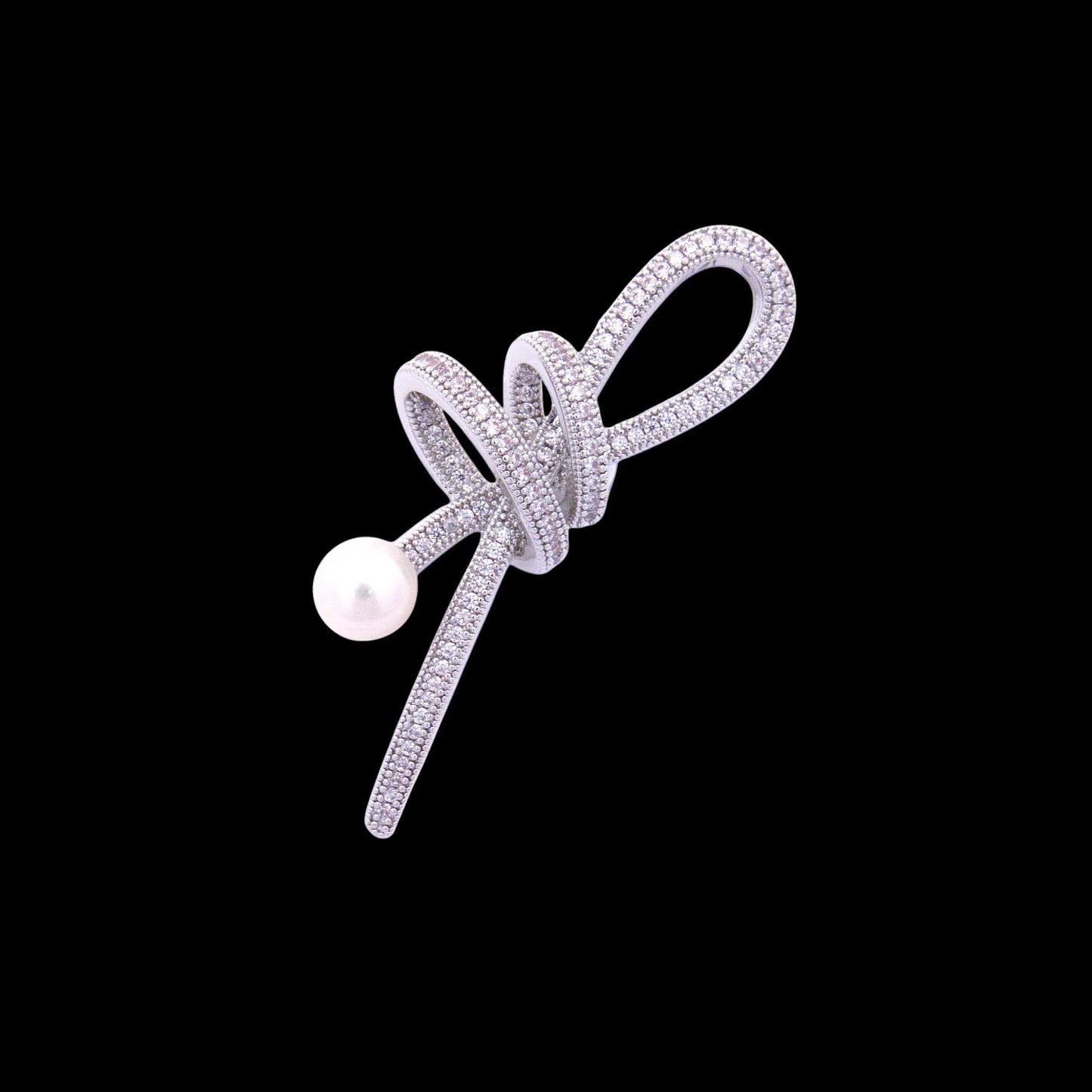 Zilverkleurige knot broche met zoetwater parel en zirkonia stenen  Victoria Valenza