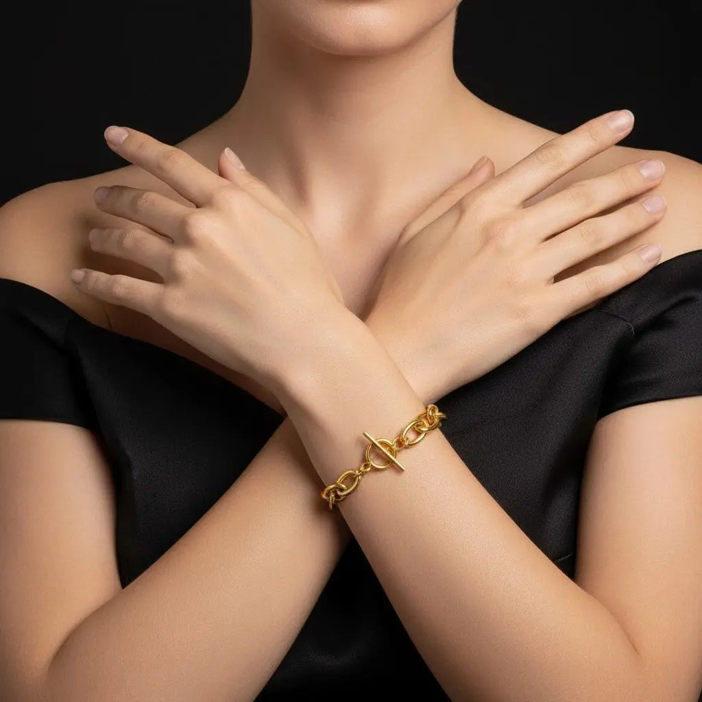 Goudkleurige RVS ovaal jasseron armband met kapittelslot  Victoria Valenza