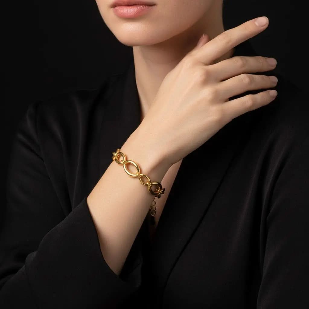 Goudkleurige RVS platte ovale schakels armband