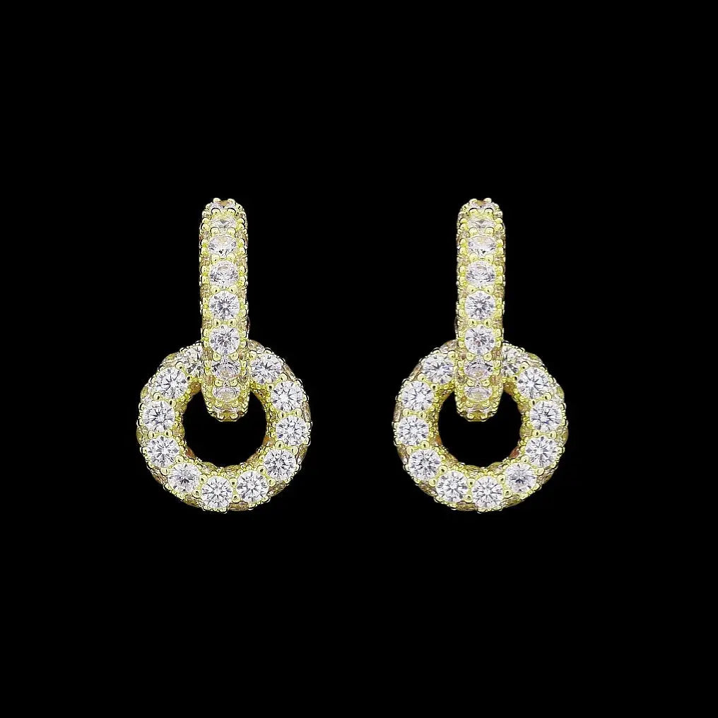 Goudkleurige cirkel oorbellen met zirkonia stenen  Victoria Valenza