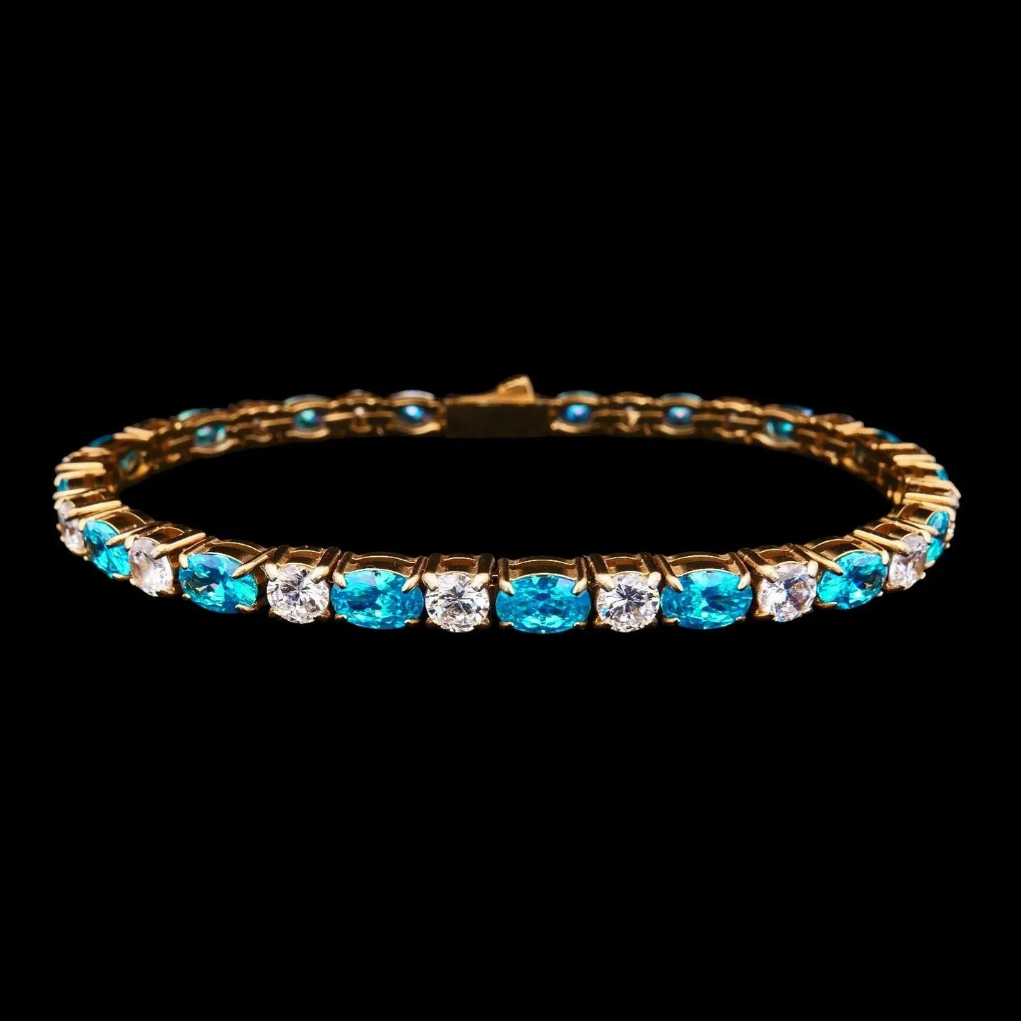 Goudkleurige Tennisarmband met Blauwe Zirkonia Stenen