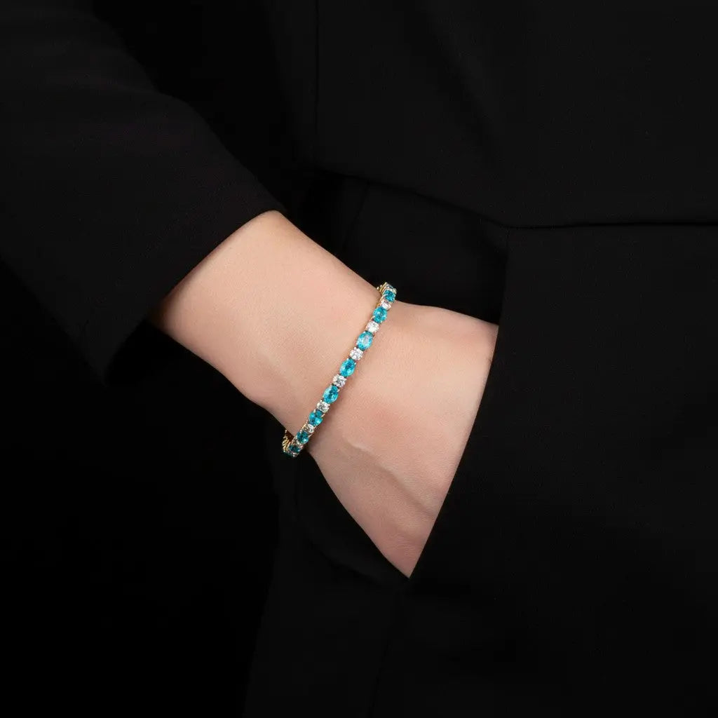 Goudkleurige Tennisarmband met Blauwe Zirkonia Stenen