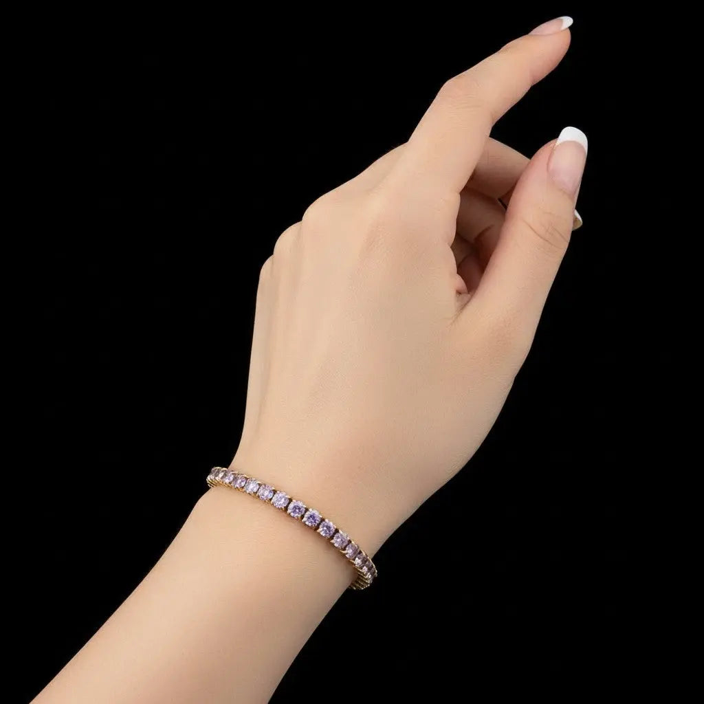 Goudkleurige Tennisarmband met Paarse Kleurverloop Zirkonia Stenen