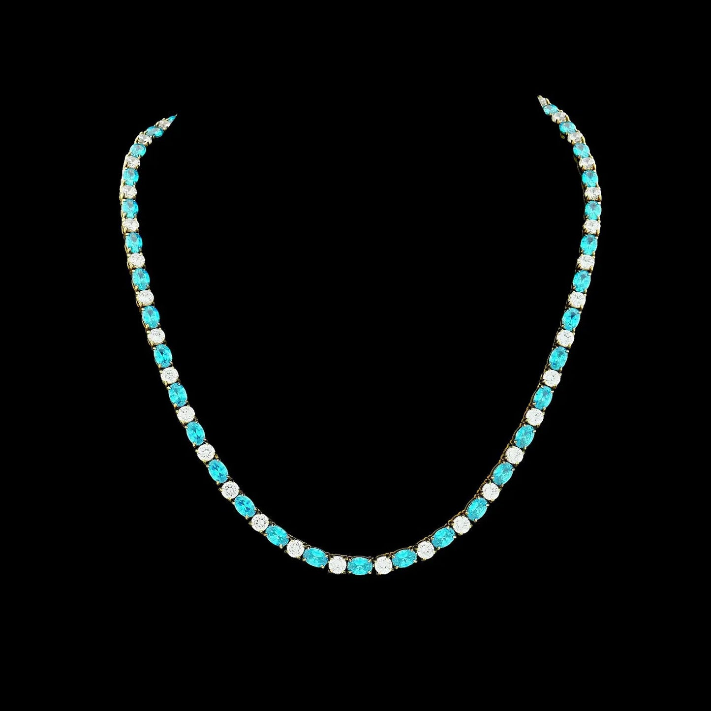 Goudkleurig RVS tenniscollier met ovale blauwe zirkonia stenen 4 mm