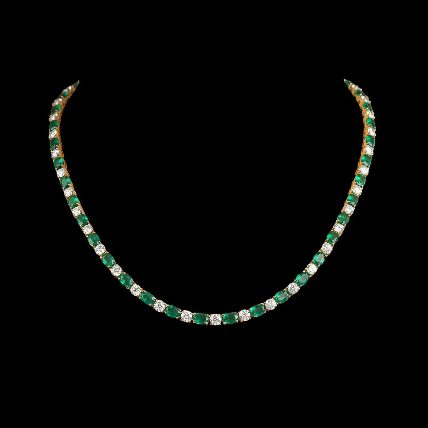 Goudkleurig RVS tenniscollier met ovale groene zirkonia stenen 4 mm