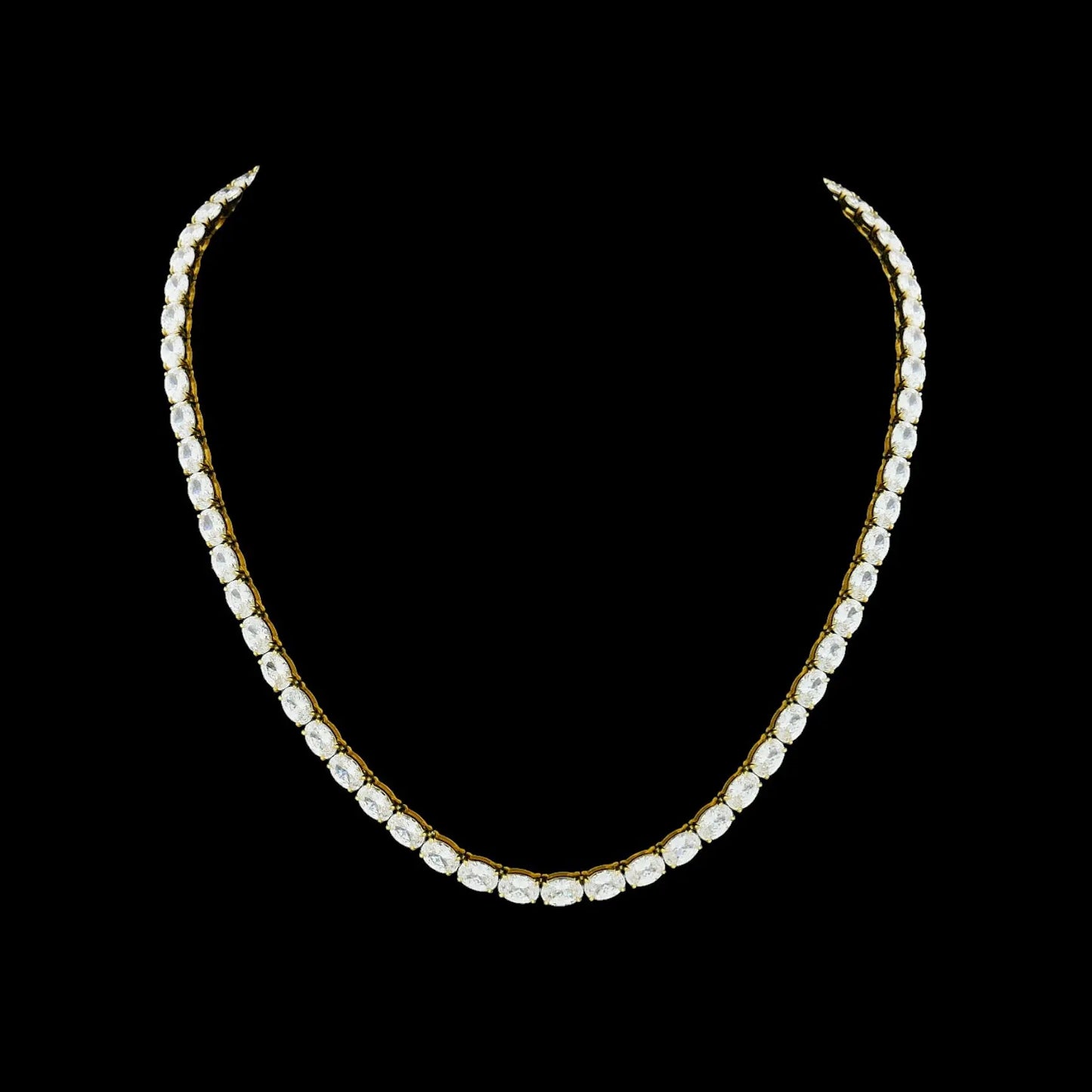 Goudkleurig RVS tenniscollier met ovale zirkonia stenen 4 mm