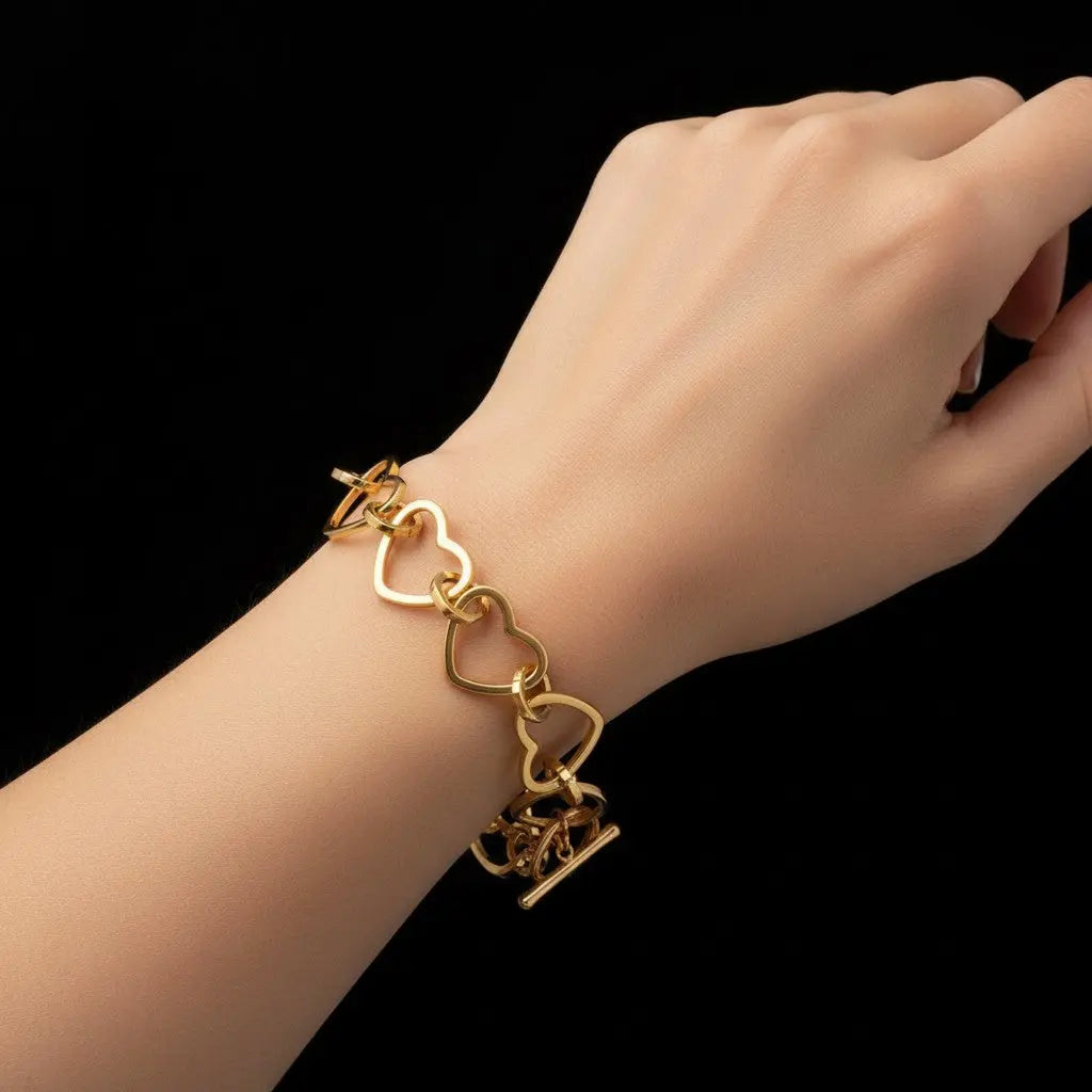 Goudkleurige RVS hartjes armband met kapittel slot