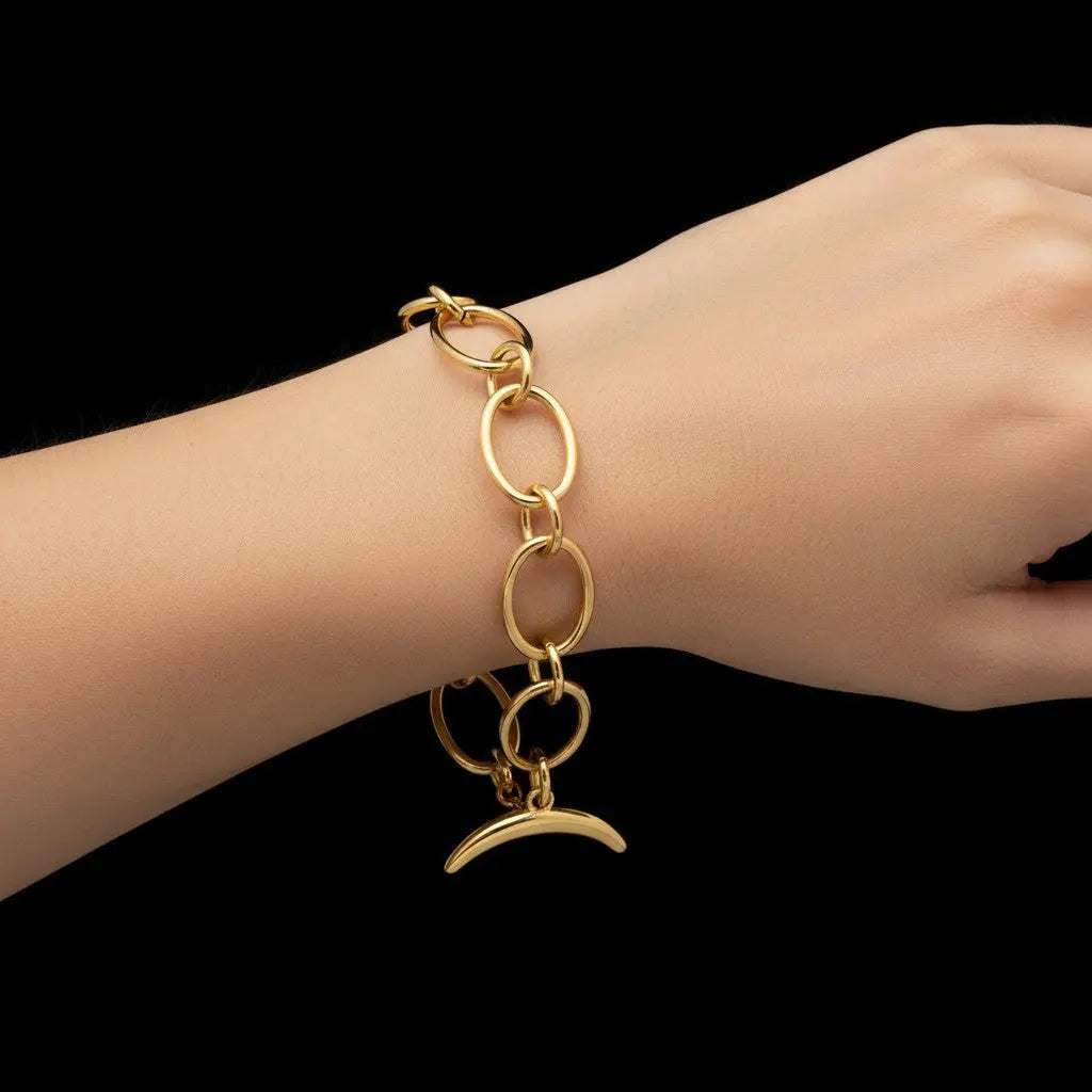 Goudkleurige RVS ovale schakelarmband met kapittel slot